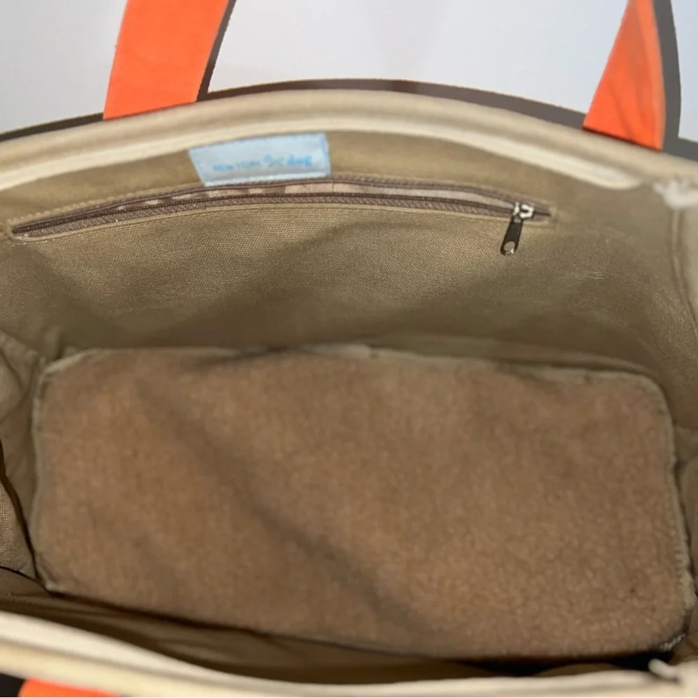New York dog orange and cream colored dog carrier cold orange small/med